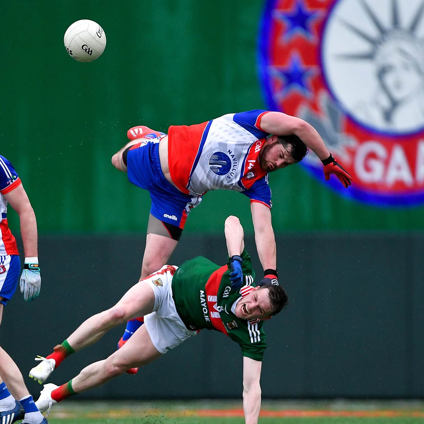 New York forward Niall Madine York clatters into Mayo defender Matthew Ruane during the Connacht Senior Championship match at Gaelic Park.